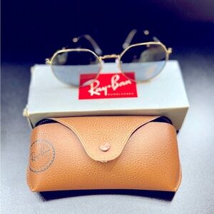 New Ray Ban gold, hexagonal sunglasses.